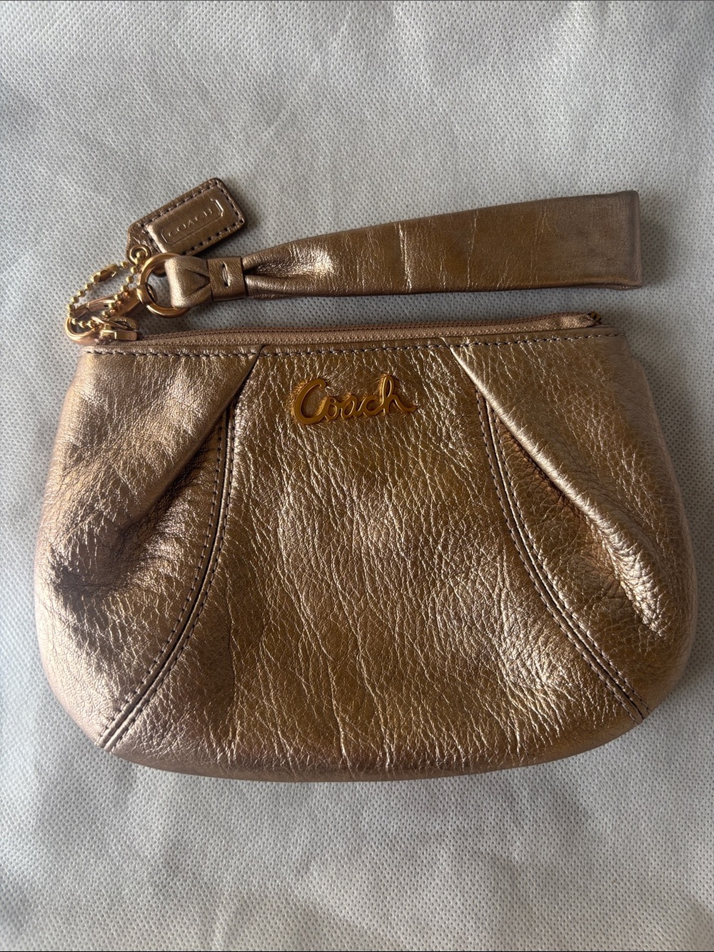 Coach Metallic Rose Gold Wristlet Clutch